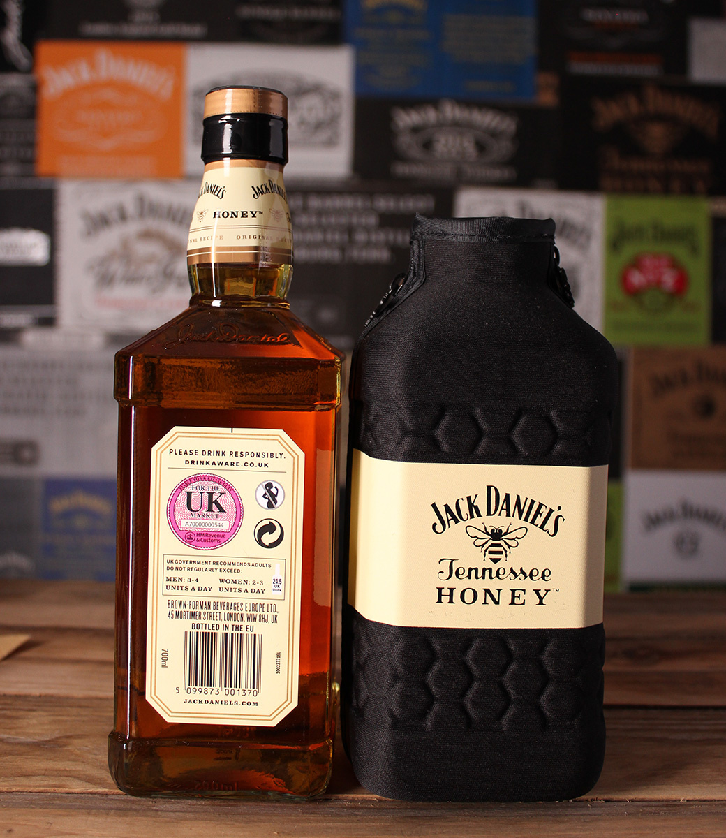 JACK DANIEL'S - Honey - 700ml - Evo - in "diving suit" Sleeve United Kingdom and also Ger