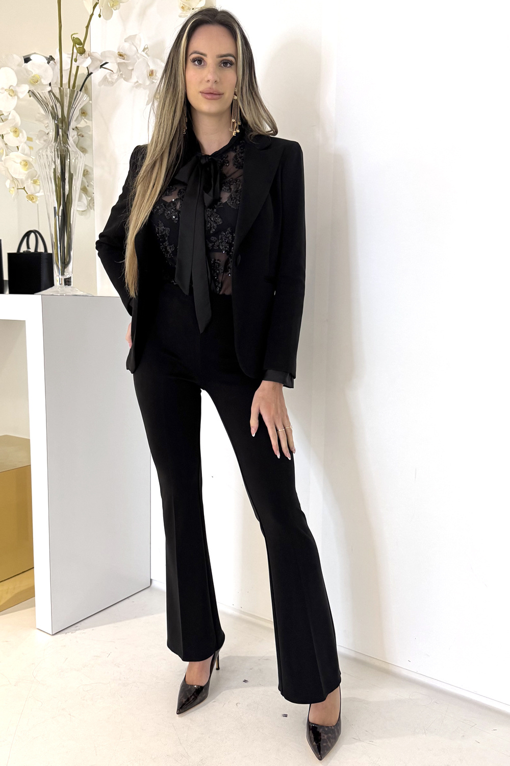 RINASCIMENTO Rinascimento Flared pantalon in jogging stof ZWART