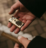 Thomas' goldenes Feuerzeug