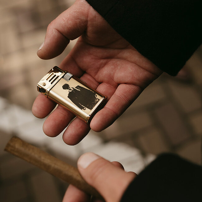 Thomas' goldenes Feuerzeug