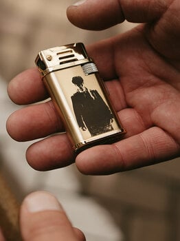 Thomas's golden lighter