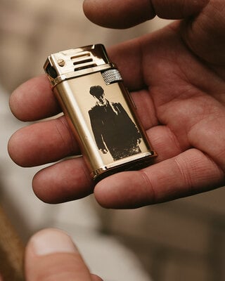 Thomas's golden lighter