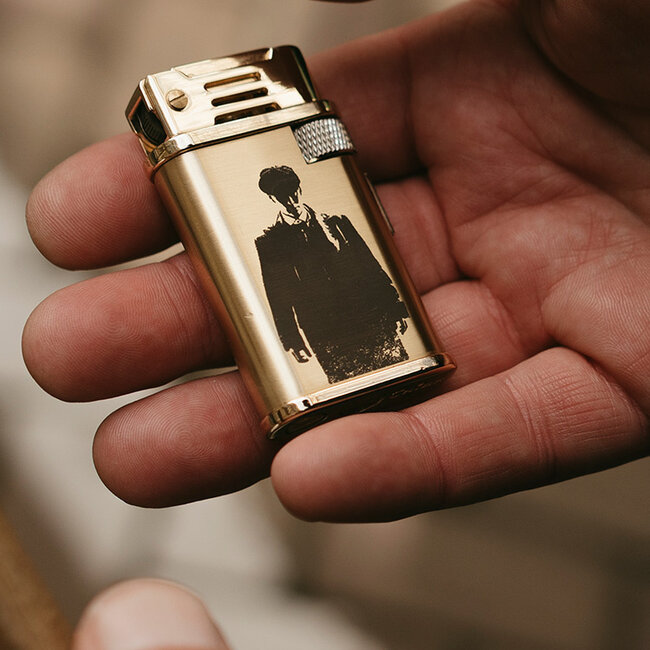 Thomas' goldenes Feuerzeug