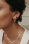 Einzelner vergoldeter Ohrring mit blauen Steinen Mai