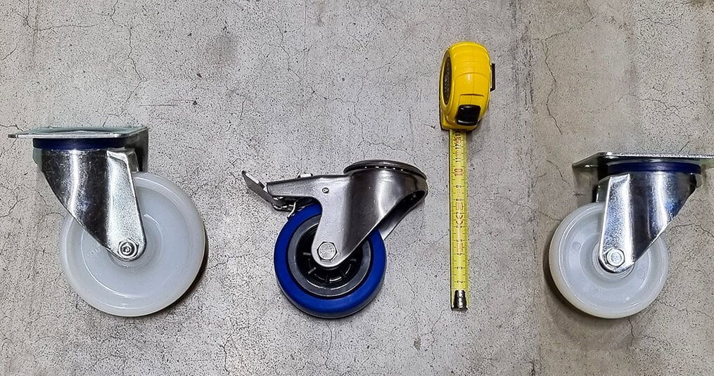 What is the overall height of a swivel castor?