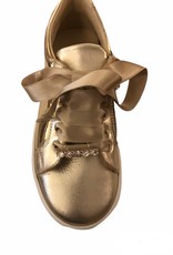 Andanines goud sneaker met strik en ritsje