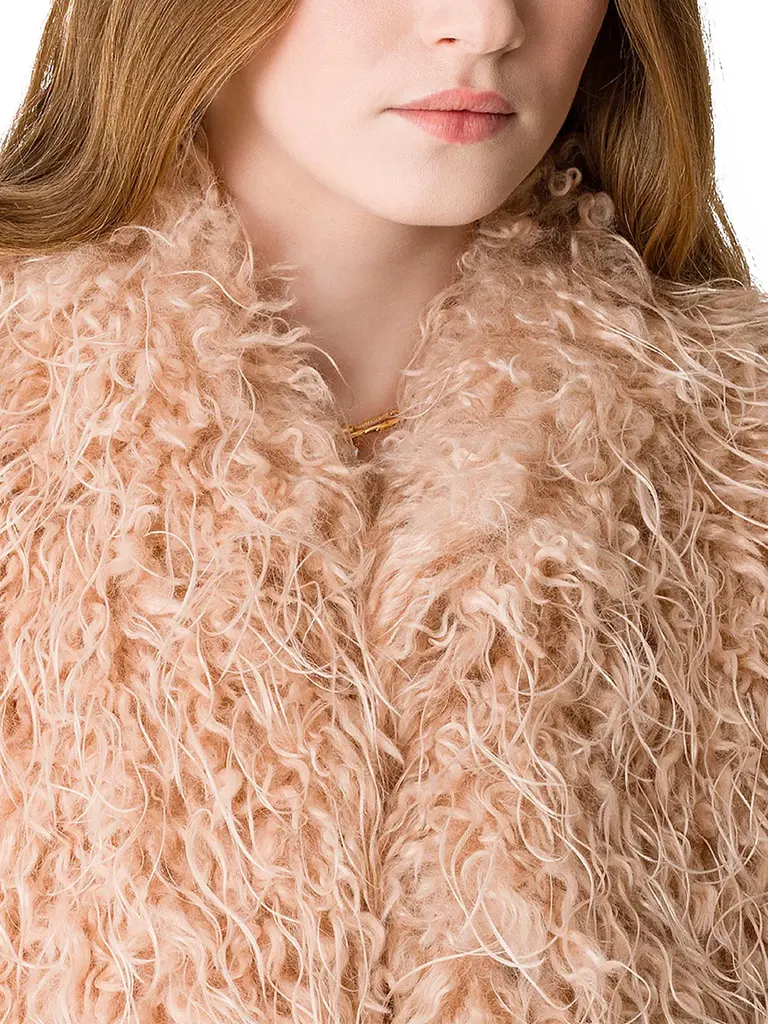 Nude furry waistcoat