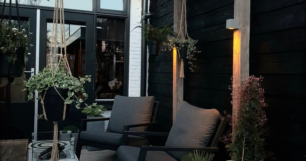Hoe geniet je in de tuin met regen