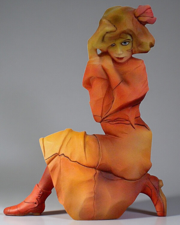 Knielend meisje in oranje rood van Egon Schiele