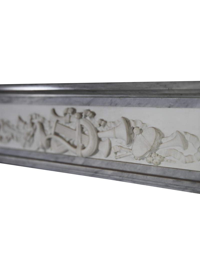 Chimenea Neoclásica Francesa – Mármol Bleu Turquin & Statuario