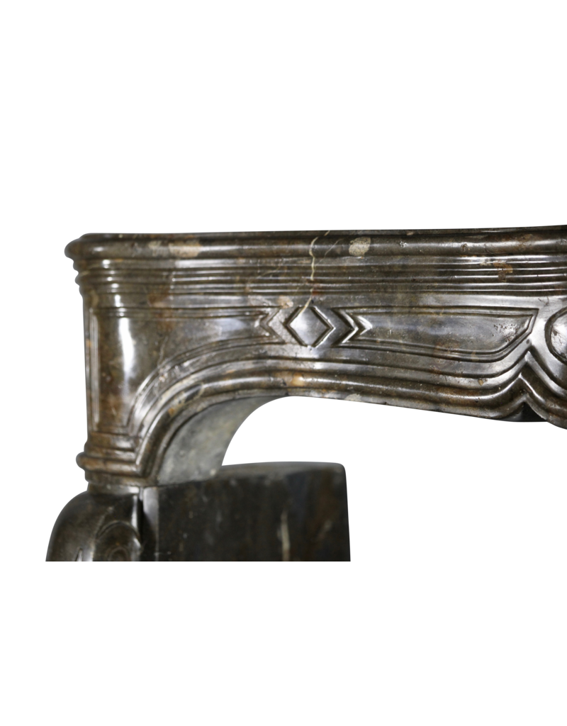Maison Leon Van den Bogaert 17th Century Chic French Antique Fireplace Surround in Dark Fossil Stone