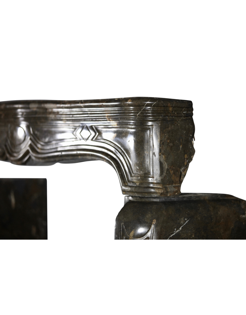 Maison Leon Van den Bogaert 17th Century Chic French Antique Fireplace Surround in Dark Fossil Stone
