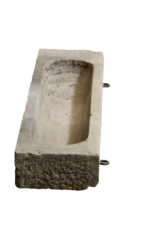 Maison Leon Van den Bogaert Ancien fragment d’auge en calcaire