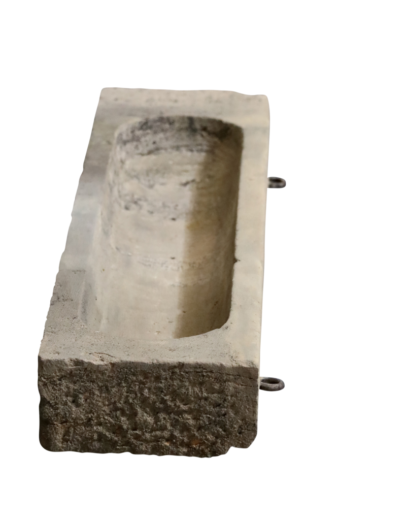 Maison Leon Van den Bogaert Ancien fragment d’auge en calcaire
