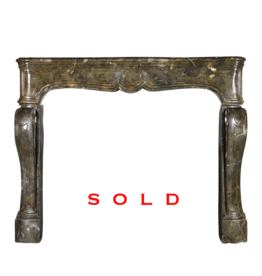 17Th Century Chique French Fireplace Surround In Dark Fossil Stone