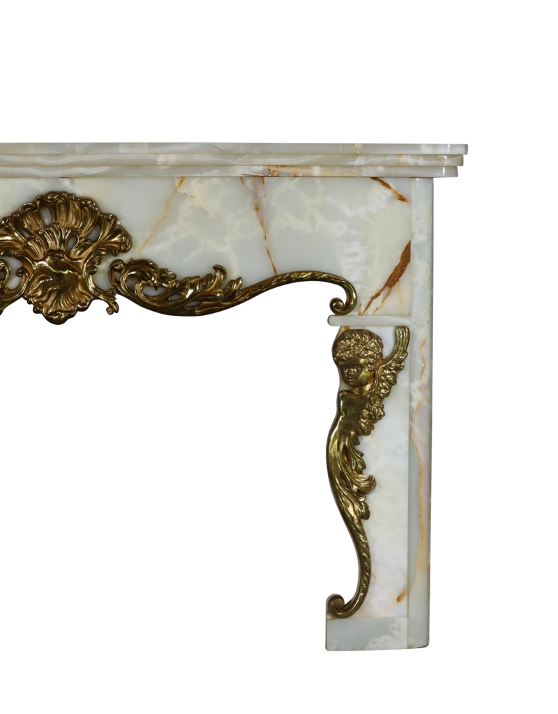 Abondant Onyx Fireplace Surround With Angels