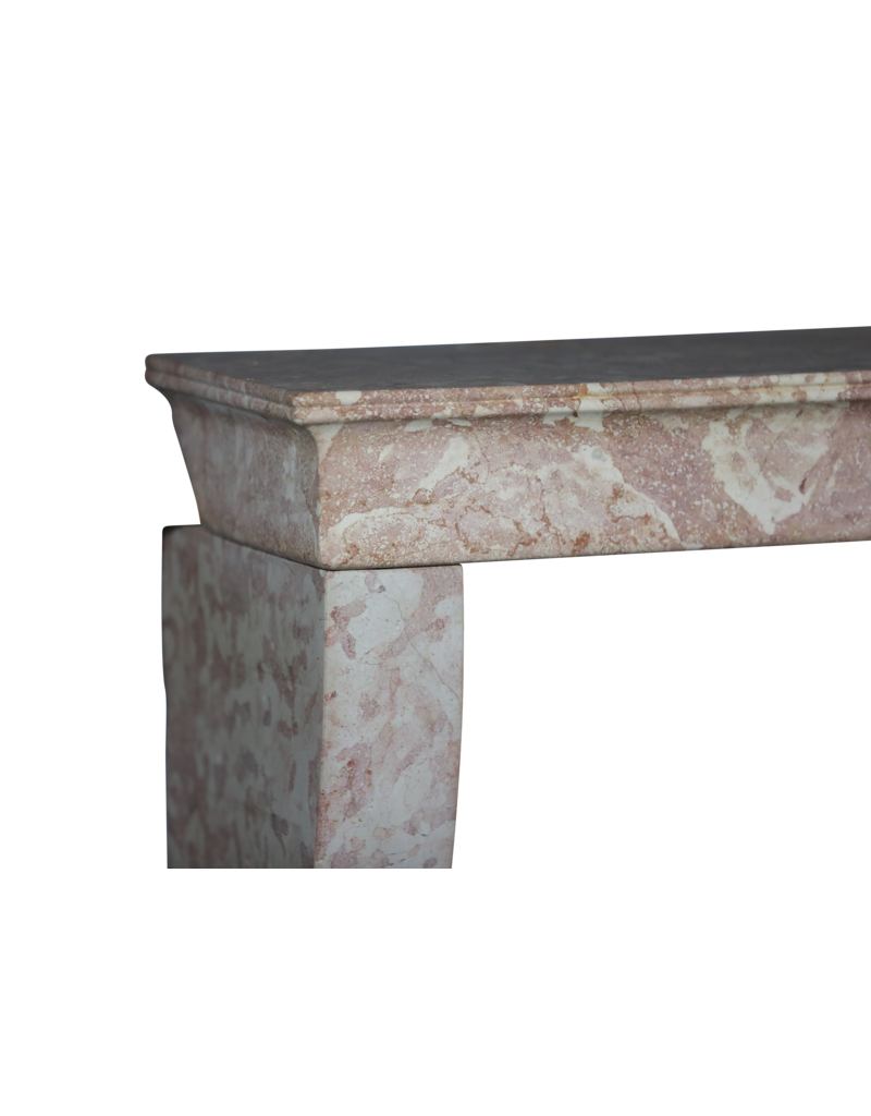 Marco de chimenea vintage de piedra rosa de Borgoña