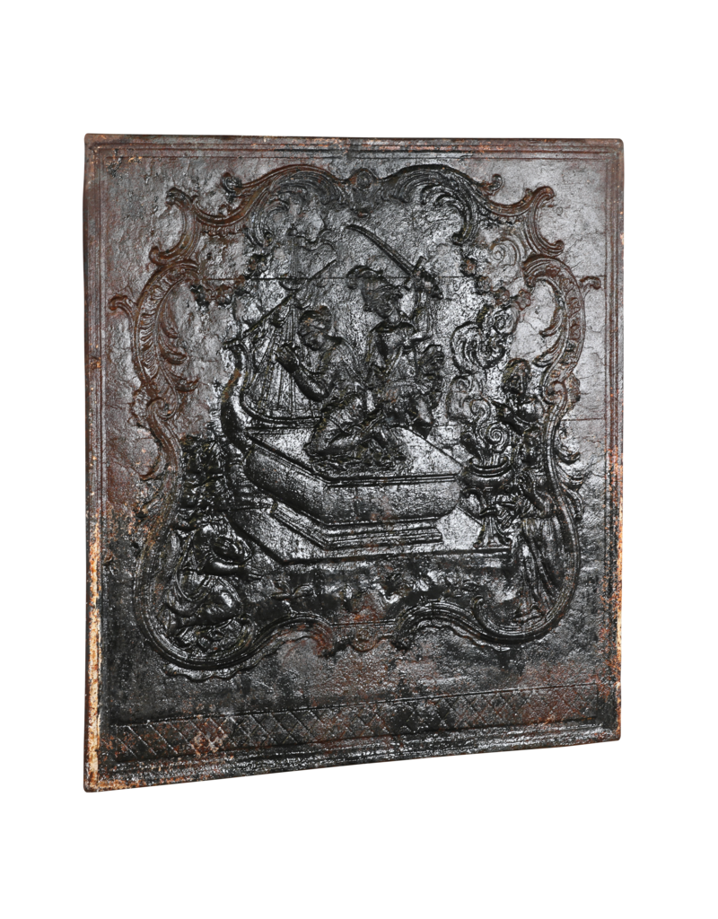 Cast Iron Fireplace Back Provides Extra Warmth And Color In The Room