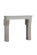 Original 17th Century Louis XIII French Rustic Small Fireplace Surround in Hard Limestone, 124 cm Exterior Width