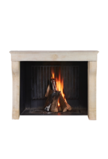 Maison Leon Van den Bogaert Elegant 19th Century Hand-Carved French Fireplace Mantel in Pale Limestone with Soft Curved Jambs