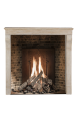 Maison Leon Van den Bogaert Authentic 19th Century French Fireplace Surround in Aged Limestone with Elegant Patina and Soft Light Reflection