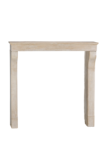 Maison Leon Van den Bogaert Authentic 19th Century French Fireplace Surround in Aged Limestone with Elegant Patina and Soft Light Reflection