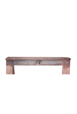 Maison Leon Van den Bogaert 16th Century French Limestone Fireplace Mantel With Original Paint Layers and Sculpted Jester’s Cap – “Dans son Jus” Castle Mantel