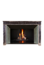 Maison Leon Van den Bogaert Exceptional Late 18th Century French Directoire Fireplace Surround in Patinated Limestone with Fine Carvings and Original Brown Surface