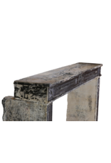 Maison Leon Van den Bogaert Exceptional Late 18th Century French Directoire Fireplace Surround in Patinated Limestone with Fine Carvings and Original Brown Surface