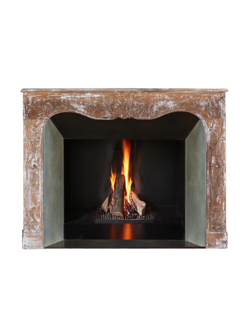 Authentic 19th Century French Rococo Fireplace Mantel in Patinated Wood with Hand-Carved Floral and Shell Ornaments