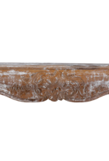 Authentic 19th Century French Rococo Fireplace Mantel in Patinated Wood with Hand-Carved Floral and Shell Ornaments