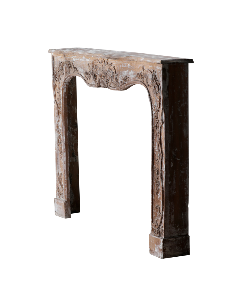 Authentic 19th Century French Rococo Fireplace Mantel in Patinated Wood with Hand-Carved Floral and Shell Ornaments