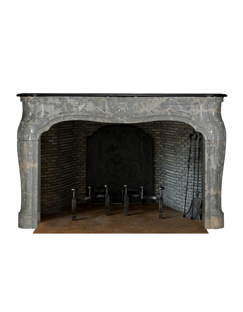 Maison Leon Van den Bogaert Exceptional Late Regency French Castle Fireplace Surround Carved in Rare Ardèche Hard Marble with Sculptural Detail and Strong Proportions