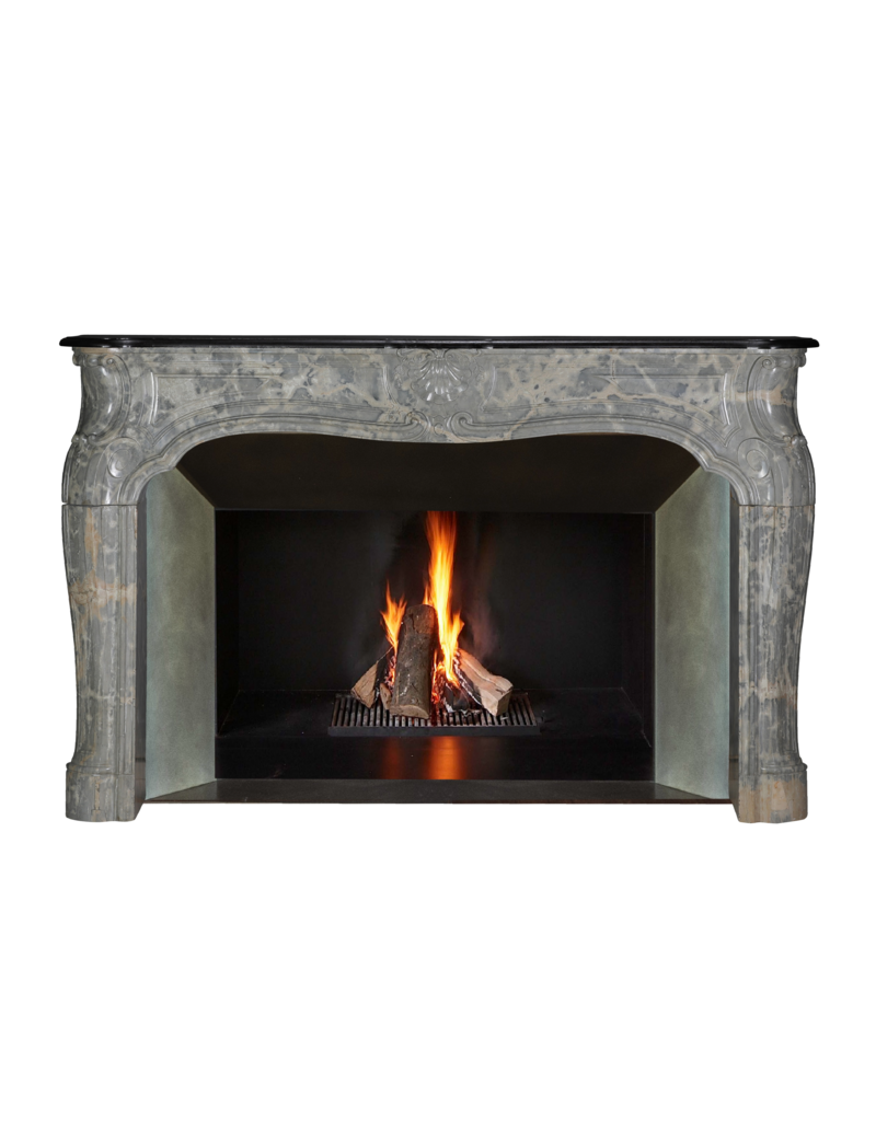 Maison Leon Van den Bogaert Exceptional Late Regency French Castle Fireplace Surround Carved in Rare Ardèche Hard Marble with Sculptural Detail and Strong Proportions