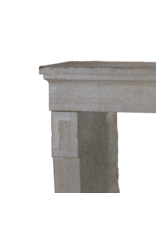 Maison Leon Van den Bogaert 17th Century Rustic French Hard Limestone Fireplace Mantel with Hand-Carved Hammered and Chamfered Details