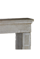 Maison Leon Van den Bogaert 17th Century Rustic French Hard Limestone Fireplace Mantel with Hand-Carved Hammered and Chamfered Details