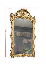 Maison Leon Van den Bogaert Antieke Franse Régence spiegel in verguld hout met origineel spiegelglas, rocaille snijwerk en warme gouden patina
