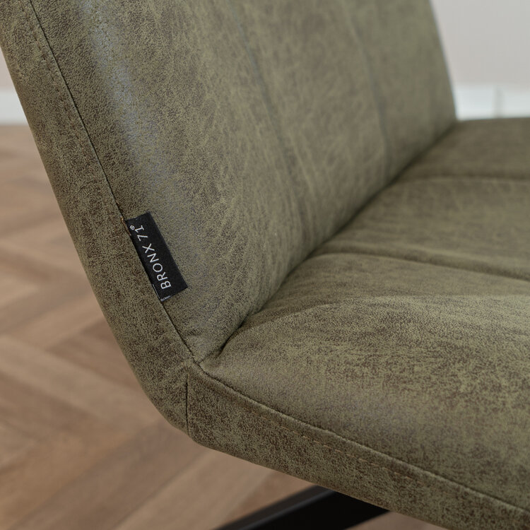 Industriële fauteuil Eevi olijfgroen eco-leer