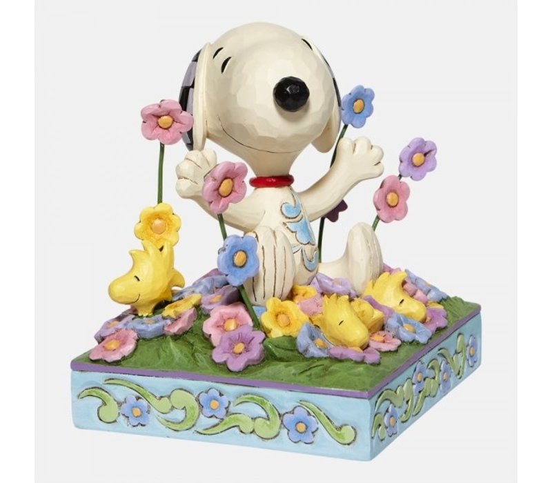 Peanuts by Jim Shore - Snoopy in bed of Flowers