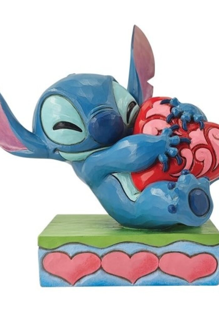 Disney Traditions - Stitch Hugging a Heart