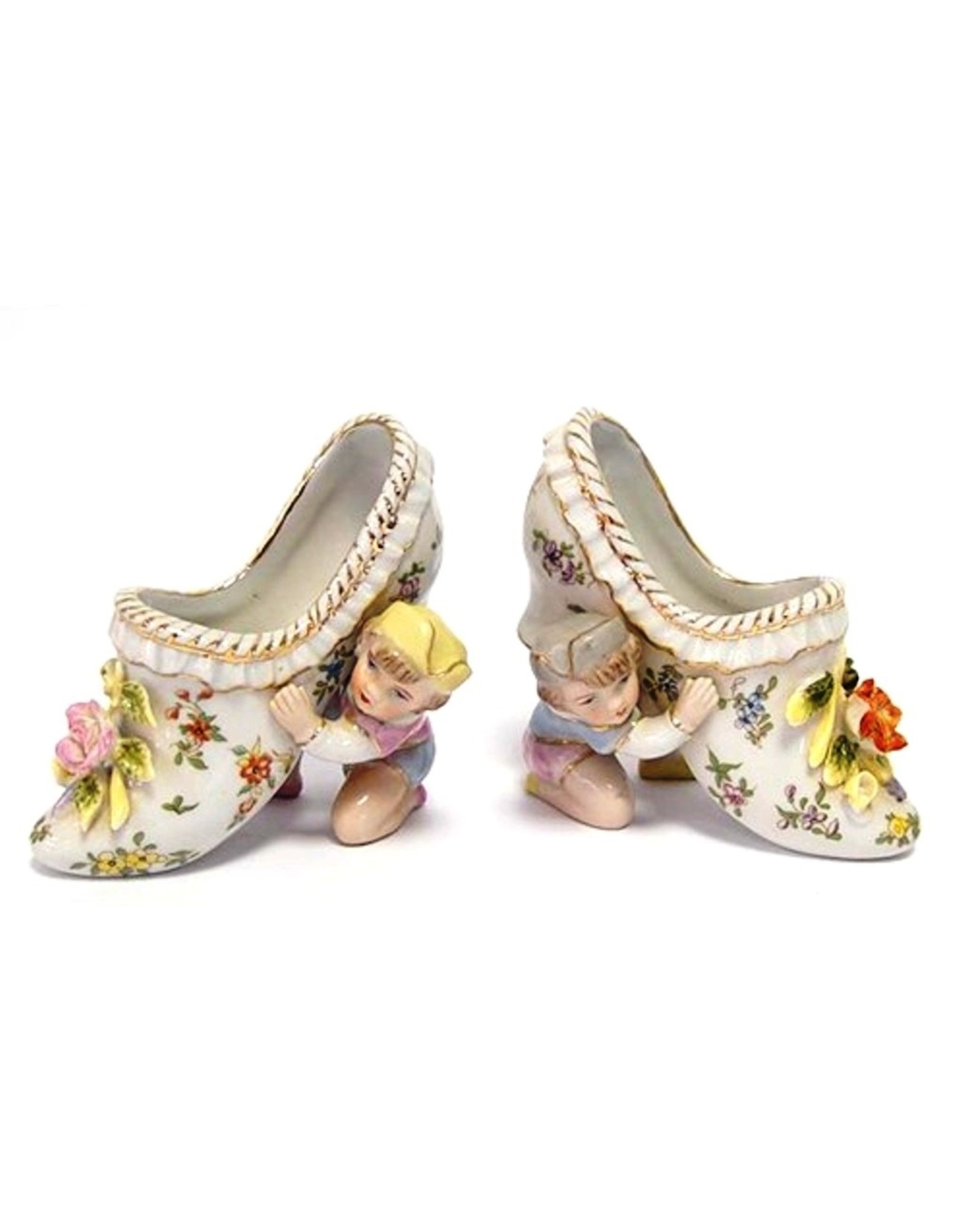 Trukado Miscellaneous - A pair of porcelain Rococo style Mules