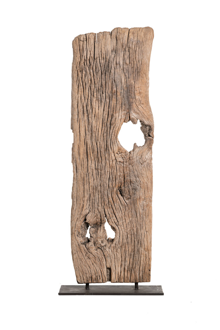 Wooden object on metal base