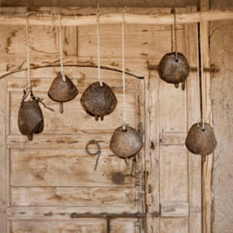 Vintage wooden camel bell on stand #1