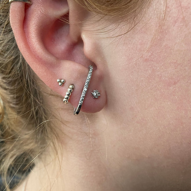 Zilveren bling bal piercing