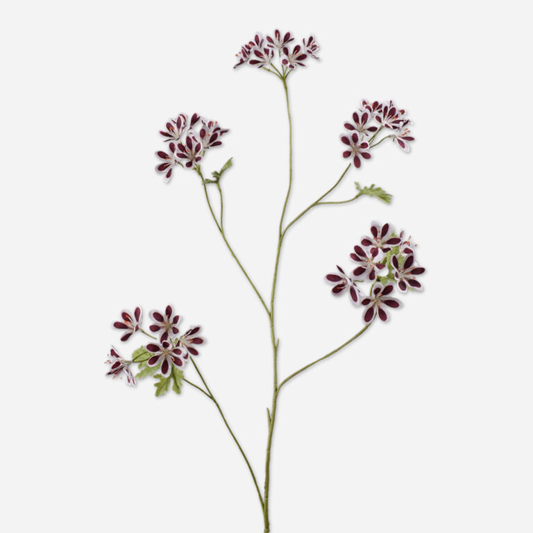 Kunststeel Geranium met witroze zijden bloemen en groene bladeren is een kunststeel met een natuurgetrouwe uitstraling en een lengte van 94 cm.