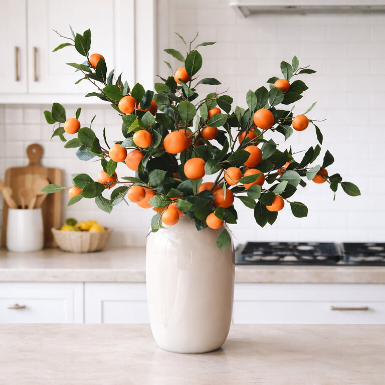 Zijden boeket Sunset Orange is een warm en rijk boeket met sinaasappel fruittakken.
