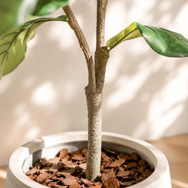 Kunstplant Ficus Lyrata met groene bladeren is een middelgrote kunstplant in binnenpot met een natuurgetrouwe uitstraling en een hoogte van 120 cm.