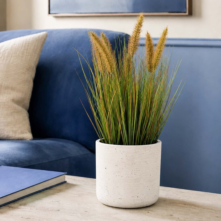 Kunstplant Pennisetum gras is een kunstgras in binnenpot met een natuurgetrouwe uitstraling en een hoogte van 45 cm.