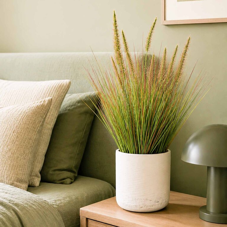 Kunstplant Pennisetum gras is een kunstgras in binnenpot met een natuurgetrouwe uitstraling en een hoogte van 58 cm.