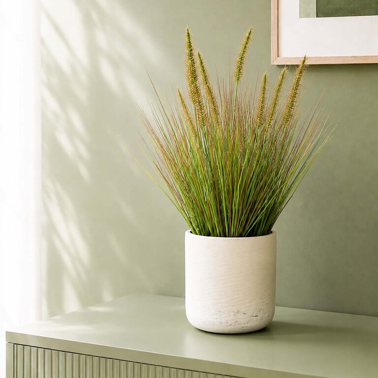 Kunstplant Pennisetum gras is een kunstgras in binnenpot met een natuurgetrouwe uitstraling en een hoogte van 58 cm.